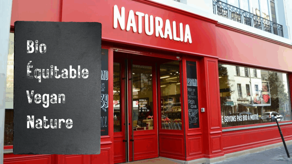 devanture de magasin bio Naturalia en France avec sa célèbre bannière rouge